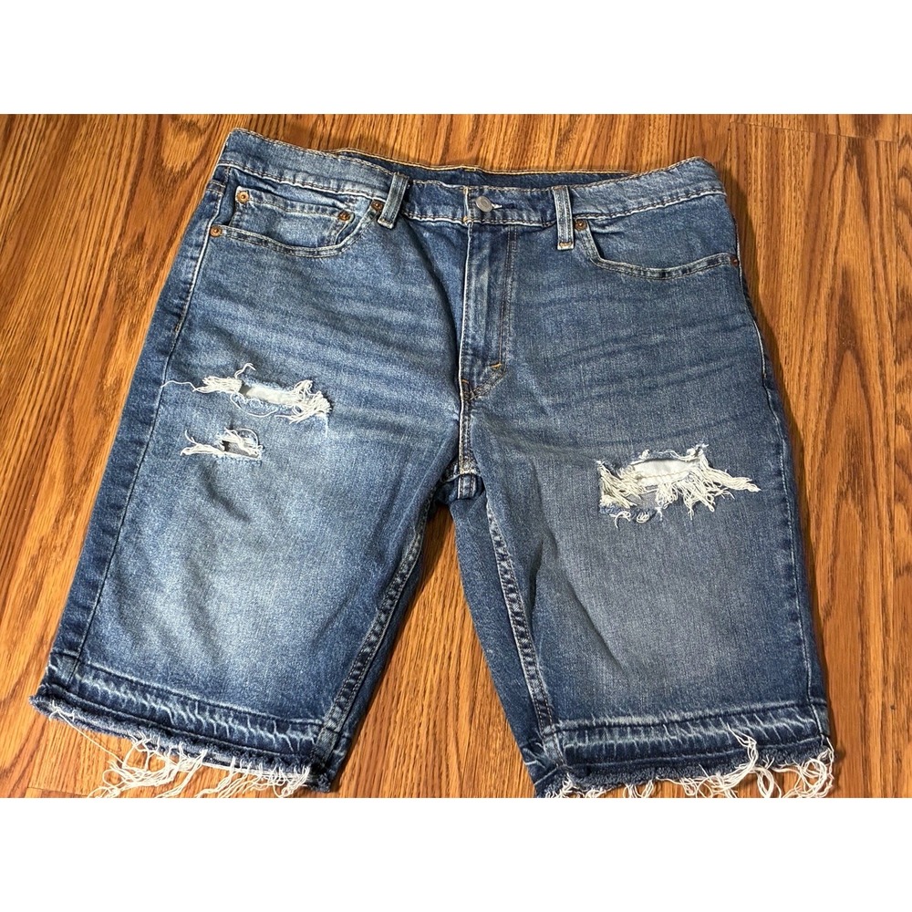 #M107 Levis Sz 36 medium-wash denim jorts distressed ripped 11" Inseam